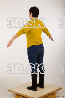 Whole body yellow sweater blue jeans black shoes a pose…